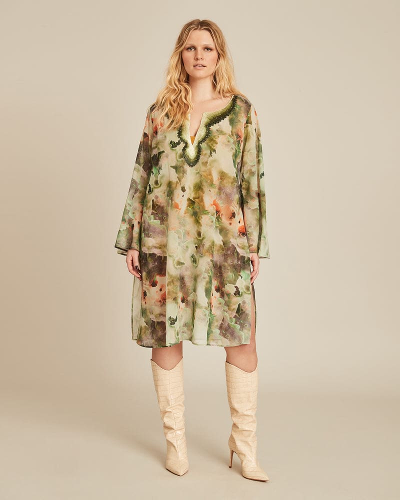 Front of a model wearing a size 1X (16-18) Valentina Silk Tunic in Green Print by Gabriella Rossetti. | dia_product_style_image_id:232756